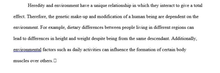 What relation exists between heredity and environment when discussing human development