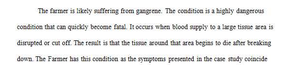 A farmer working on a piece of machinery gets his shirtsleeve caught in a moving piece of the equipment.